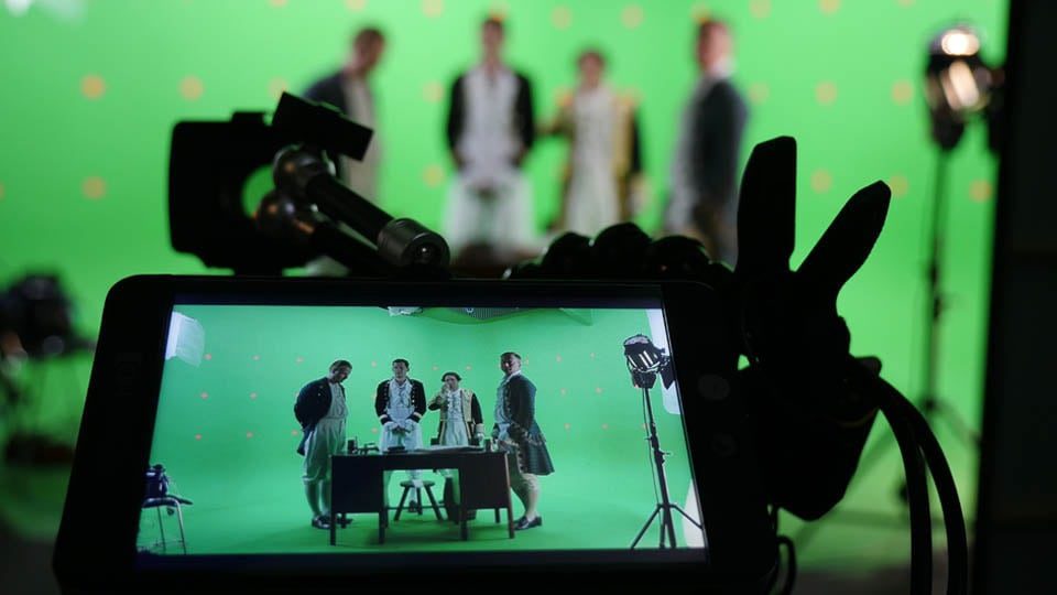 video production in the green screen studio image