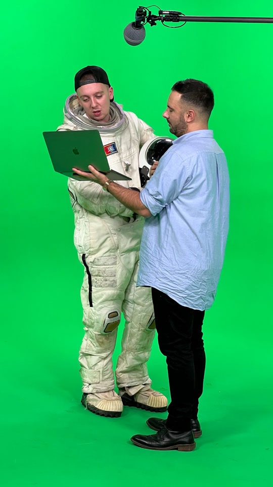 Aitch the rapper on nthe green screen infinity cove image