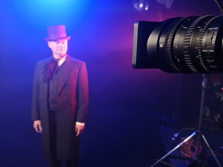 Actor in period costume during film shoot in Blackout studio Manchester